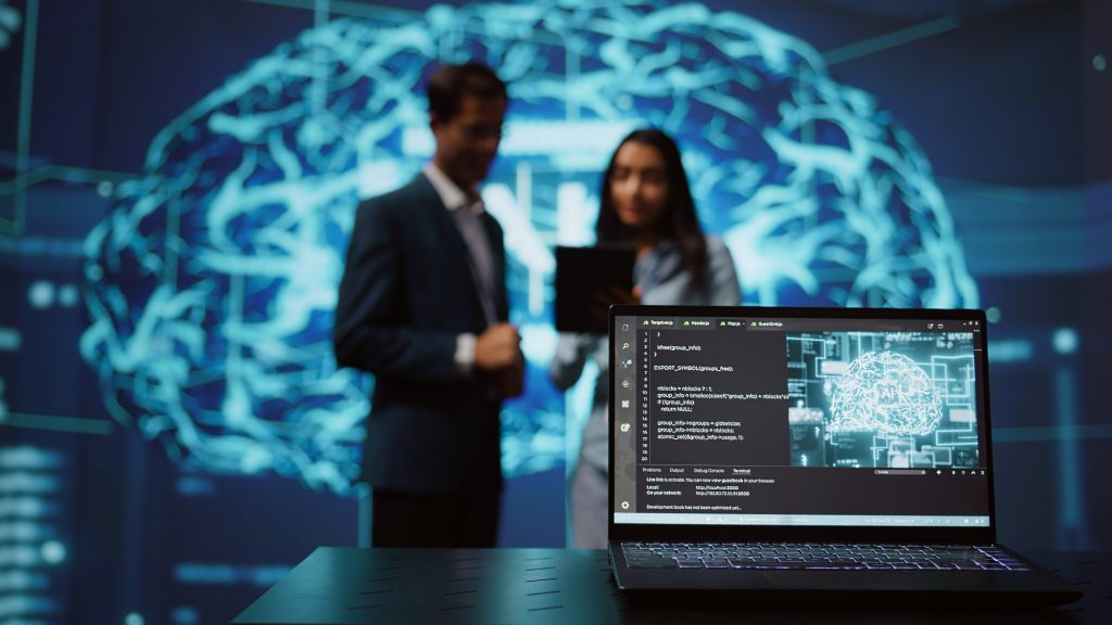 Close up of notebook used by employees developing AI concierge systems in tech startup
